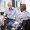 Two men speaking about a CLEO product